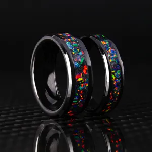 Matching Black Fire Opal Glowstone Wedding Ring Set on Black Ceramic