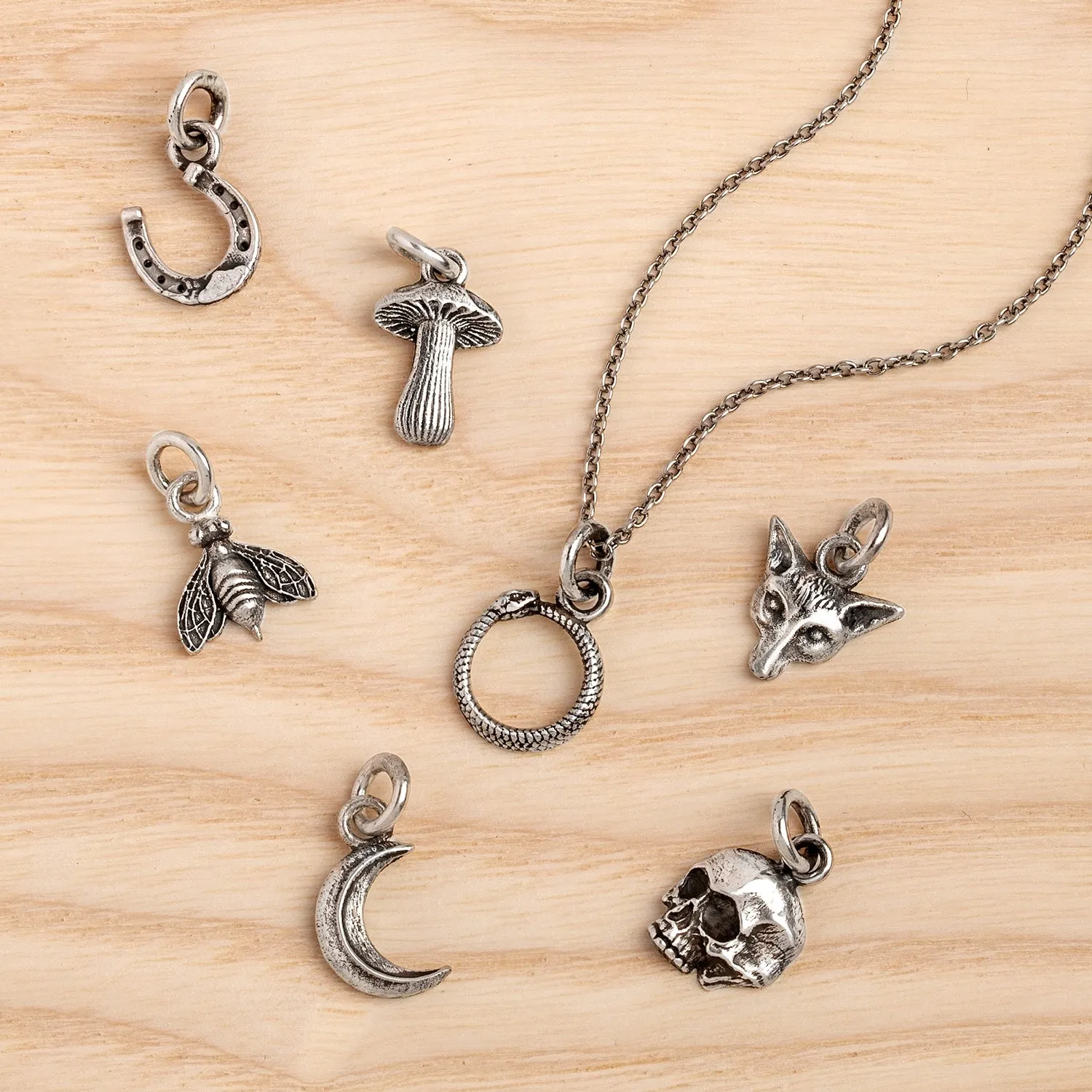 Sun Symbol Charm